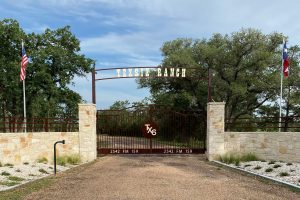 texas themed ranch gate with stone - tall