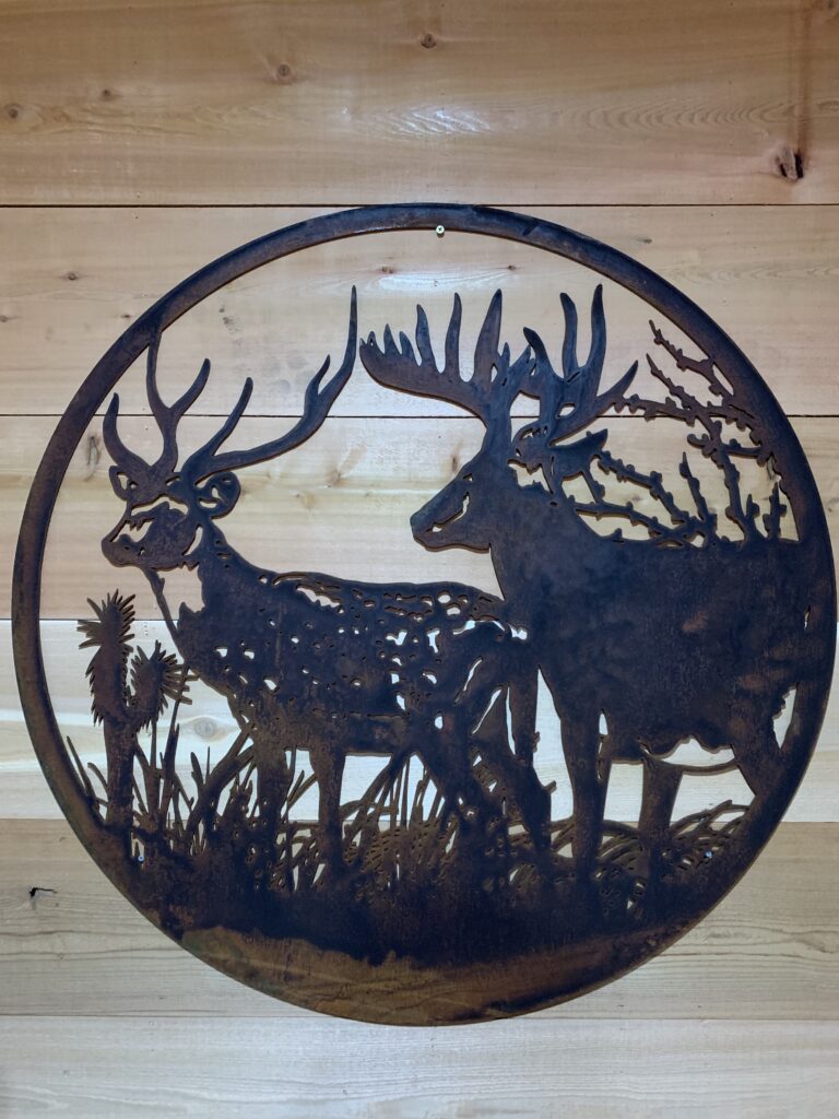two deer in a metal circle cut out