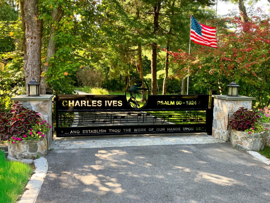 Custom metal gate dedicated to Charles Ives