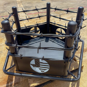 Black fire pit with large barb wire